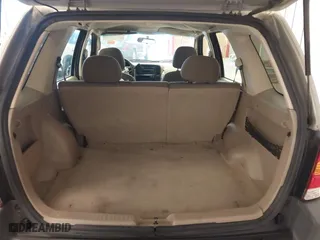 2004 Ford Escape XLT with VIN 1FMYU93164KB05521, listed as a IAAI auction lot 41723219 with 246,369 mi miles. Bid and sale history available at carsss.com. Image 17.