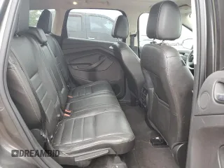 2016 Ford Escape Titanium with VIN 1FMCU9J95GUA58624, listed as a Copart auction lot 59915305 with 102,061 mi miles and Salvage title. Bid and sale history available at DreamBid. Image 11.