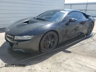 2015 BMW i8 z VIN WBY2Z2C57FV391448, wystawiony jako Copart lot #49895954 z przebiegiem 84 874 mil mil oraz . Historia ofert i sprzedaży dostępna na DreamBid. Obrazek 1.