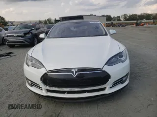 2014 Tesla Model S 60 с VIN 5YJSA1H18EFP33284, выставлен на аукционе Copart как лот 57434905 с пробегом 156 750 миль миль и Списание • Salvage title. История ставок и продаж доступна на DreamBid. Изображение 5.