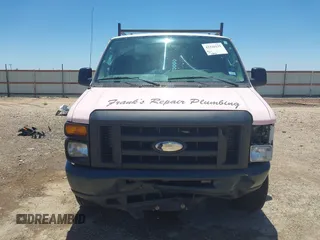 2014 Ford Econoline Cargo Commercial z VIN 1FTNE2EL2EDA81251, wystawiony jako IAAI lot #42326135 z przebiegiem 158 932 mil mil oraz . Historia ofert i sprzedaży dostępna na DreamBid. Obrazek 13.
