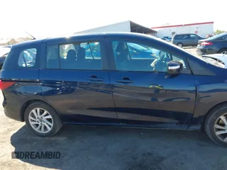 2014 Mazda 5 Sport with VIN JM1CW2BLXE0175975, listed as a IAAI auction lot 40278614 with 102,430 mi miles and . Bid and sale history available at DreamBid. Image 13.