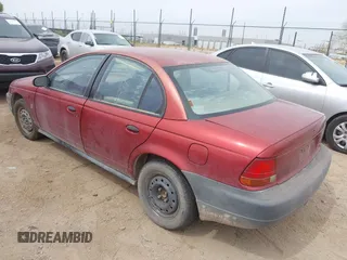 1997 Saturn SL with VIN 1G8ZH5282VZ341543, listed as a IAAI auction lot 42367589 with 202,201 mi miles and . Bid and sale history available at DreamBid. Image 3.