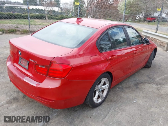 2014 BMW 3 Series 320i with VIN WBA3B1G52ENS78033, listed as a IAAI auction lot 41780475 with 138,987 mi miles. Bid and sale history available at carsss.com. Image 4.