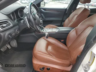 2014 Maserati Ghibli z VIN ZAM57XSA3E1101014, wystawiony jako Copart lot #59591765 z przebiegiem 91 892 mil mil oraz Czysty tytuł • Clean title. Historia ofert i sprzedaży dostępna na DreamBid. Obrazek 7.