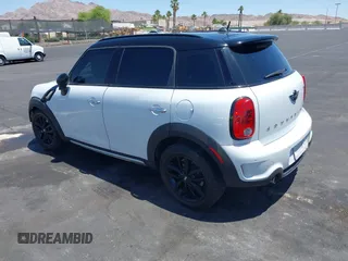 2015 MINI Countryman S with VIN WMWZC3C58FWT05613, listed as a IAAI auction lot 42374870 with 124,214 mi miles and . Bid and sale history available at DreamBid. Image 3.