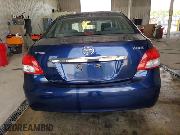 2008 Toyota Yaris with VIN JTDBT903081226785, listed as a Copart auction lot 54944245 with 111,133 mi miles and Salvage Title. Bid and sale history available at DreamBid. Image 6.