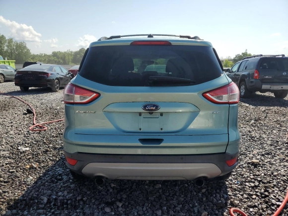 2013 Ford Escape SE with VIN 1FMCU0G99DUD03147, listed as a Copart auction lot 60152775 with 156,551 mi miles and Salvage title. Bid and sale history available at DreamBid. Image 6.