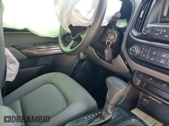 2015 GMC Canyon 2WD with VIN 1GTH5AE30F1182024, listed as a Copart auction lot 77032494 with 55,845 mi miles and Salvage Title. Bid and sale history available at carsss.com. Image 8.
