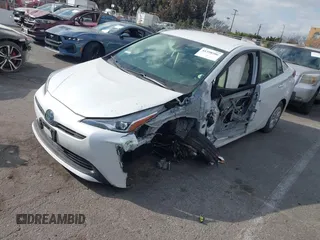2021 Toyota Prius L Eco with VIN JTDKAMFUXM3144845, listed as a IAAI auction lot 41358306 with Not provided miles and . Bid and sale history available at DreamBid. Image 17.