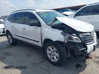 2016 Chevrolet Traverse LS z VIN 1GNKRFKD0GJ267216, wystawiony jako IAAI lot #42168840 z przebiegiem 166 820 mil mil oraz . Historia ofert i sprzedaży dostępna na DreamBid. Obrazek 1.