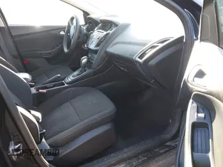 2015 Ford Focus SE with VIN 1FADP3F29FL210973, listed as a IAAI auction lot 41874367 with 128,705 mi miles. Bid and sale history available at carsss.com. Image 5.