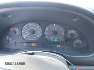 1999 Ford Mustang GT z VIN 1FAFP45X4XF117368, wystawiony jako IAAI lot #42714841 z przebiegiem 135 368 mil mil oraz . Historia ofert i sprzedaży dostępna na DreamBid. Obrazek 7.