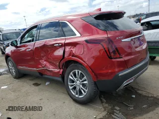 2023 Cadillac XT5 FWD Premium Luxury z VIN 1GYKNCRS5PZ173528, wystawiony jako Copart lot #55805605 z przebiegiem 7 789 mil mil oraz Szkoda całkowita • Salvage title. Historia ofert i sprzedaży dostępna na DreamBid. Obrazek 2.