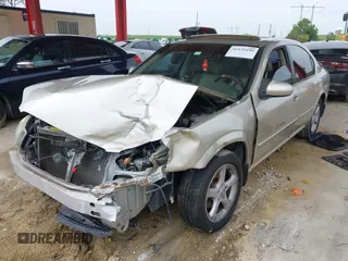 2000 Nissan Maxima GXE z VIN JN1CA31D8YT744603, wystawiony jako IAAI lot #42435490 z przebiegiem Nie podano mil oraz . Historia ofert i sprzedaży dostępna na DreamBid. Obrazek 18.
