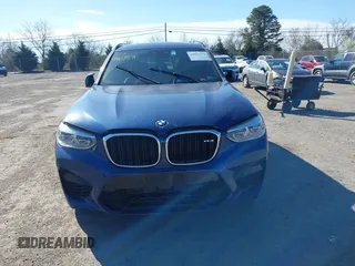 2021 BMW X3 M z VIN 5YMTS0C06M9F45134, wystawiony jako IAAI lot #41867376 z przebiegiem 35 237 mil mil oraz . Historia ofert i sprzedaży dostępna na DreamBid. Obrazek 12.