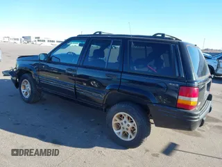 1996 Jeep Grand Cherokee Limited with VIN 1J4GZ78S5TC196338, listed as a IAAI auction lot 41199541 with Not Provided miles. Bid and sale history available at carsss.com. Image 3.