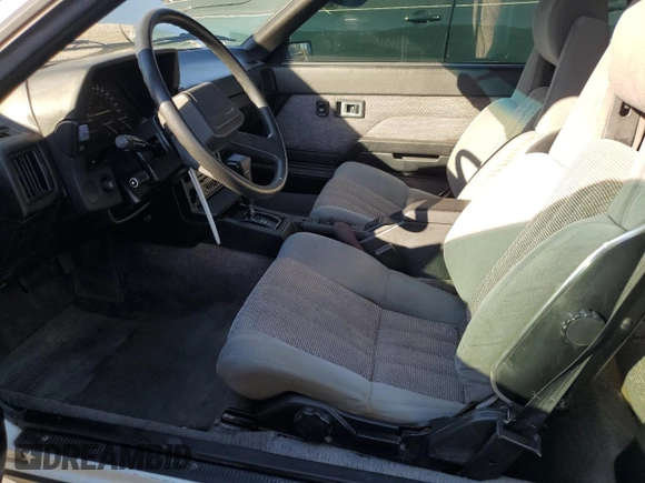 1985 Toyota Celica GTS with VIN JT5RA65K1F4055412, listed as a Copart auction lot 79221624 with 97,017 mi miles and Salvage Title. Bid and sale history available at carsss.com. Image 7.