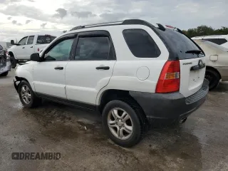2005 Kia Sportage LX with VIN KNDJF723557078730, listed as a Copart auction lot 79823504 with 166,509 mi miles and Salvage Title. Bid and sale history available at carsss.com. Image 2.