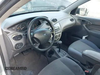 2004 Ford Focus ZTS with VIN 1FAFP38Z74W154059, listed as a IAAI auction lot 41695294 with 146,270 mi miles and . Bid and sale history available at carsss.com. Image 5.