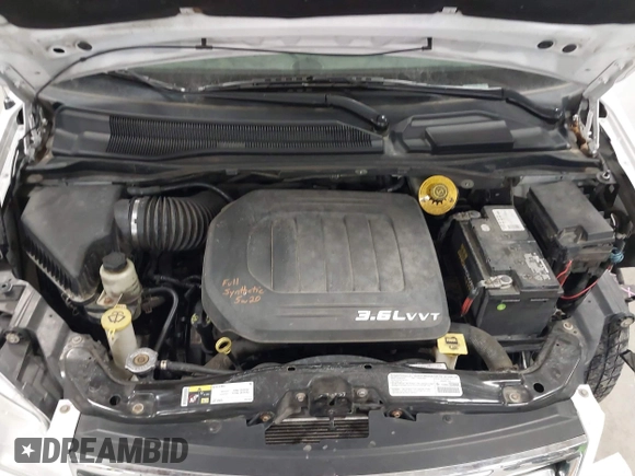 2014 Chrysler Town & Country Limited with VIN 2C4RC1GG7ER178802, listed as a IAAI auction lot 41863918 with 103,777 mi miles and . Bid and sale history available at DreamBid. Image 10.