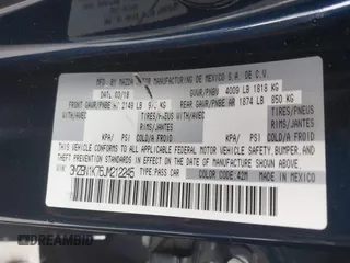 2018 Mazda 3 Sport z VIN 3MZBN1K76JM212245, wystawiony jako IAAI lot #42348528 z przebiegiem 77 994 mil mil oraz . Historia ofert i sprzedaży dostępna na DreamBid. Obrazek 9.