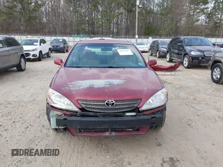 2002 Toyota Camry LE z VIN 4T1BE32K82U005531, wystawiony jako IAAI lot #41650283 z przebiegiem 328 259 mil mil oraz . Historia ofert i sprzedaży dostępna na DreamBid. Obrazek 13.