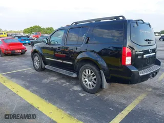 2012 Nissan Pathfinder LE with VIN 5N1AR1NN5CC607403, listed as a IAAI auction lot 41813677 with 217,854 mi miles. Bid and sale history available at carsss.com. Image 3.