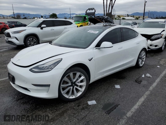 2019 Tesla Model 3 Mid Range z VIN 5YJ3E1EA3KF337854, wystawiony jako Copart lot #48472855 z przebiegiem 113 562 mil mil oraz Szkoda całkowita • Salvage title. Historia ofert i sprzedaży dostępna na DreamBid. Obrazek 1.