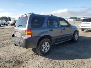 2006 Ford Escape XLT with VIN 1FMYU931X6KA57864, listed as a Copart auction lot 87063254 with 216,170 mi miles and Salvage Title. Bid and sale history available at carsss.com. Image 3.