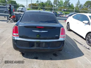 2014 Chrysler 300 with VIN 2C3CCAAG4EH252864, listed as a IAAI auction lot 42056787 with 185,063 mi miles. Bid and sale history available at carsss.com. Image 16.