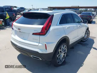 2024 Cadillac XT4 AWD Premium Luxury with VIN 1GYFZDR40RF100102, listed as a IAAI auction lot 41987175 with 4,935 mi miles and . Bid and sale history available at DreamBid. Image 4.