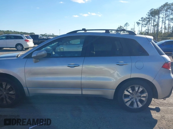 2010 Acura RDX Technology z VIN 5J8TB1H59AA005059, wystawiony jako IAAI lot #40879854 z przebiegiem 213 955 mil mil oraz . Historia ofert i sprzedaży dostępna na DreamBid. Obrazek 14.
