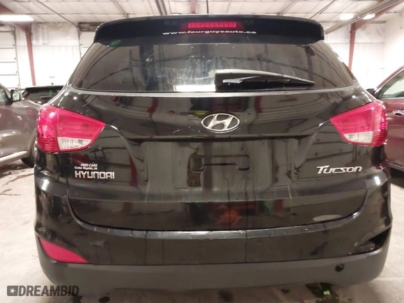 2013 Hyundai Tucson GLS with VIN KM8JU3AC0DU754948, listed as a IAAI auction lot 41811891 with 139,056 mi miles. Bid and sale history available at carsss.com. Image 21.