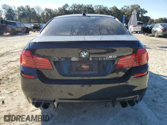 2016 BMW M5 with VIN WBSFV9C57GD595447, listed as a Copart auction lot 41343845 with 50,029 mi miles and Salvage Title. Bid and sale history available at carsss.com. Image 6.