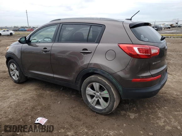 2013 Kia Sportage LX с VIN KNDPB3A28D7512869, выставлен на аукционе Copart как лот 87435794 с пробегом 92 717 миль миль и Чистый • Clean title. История ставок и продаж доступна на DreamBid. Изображение 2.