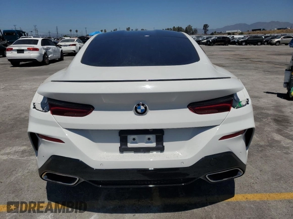 2020 BMW 8 Series M850i xDrive z VIN WBABC4C00LCE77534, wystawiony jako Copart lot #57640795 z przebiegiem Nie podano mil oraz Szkody całkowita. Historia ofert i sprzedaży dostępna na DreamBid. Obrazek 6.