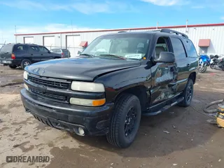 2001 Chevrolet Tahoe LS with VIN 1GNEK13T41R219642, listed as a IAAI auction lot 41655081 with 243,737 mi miles. Bid and sale history available at carsss.com. Image 2.
