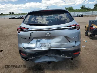2016 Mazda CX-9 Grand Touring с VIN JM3TCADY2G0121026, выставлен на аукционе Copart как лот 60518105 с пробегом 104 923 миль миль и Списание • Salvage title. История ставок и продаж доступна на DreamBid. Изображение 6.