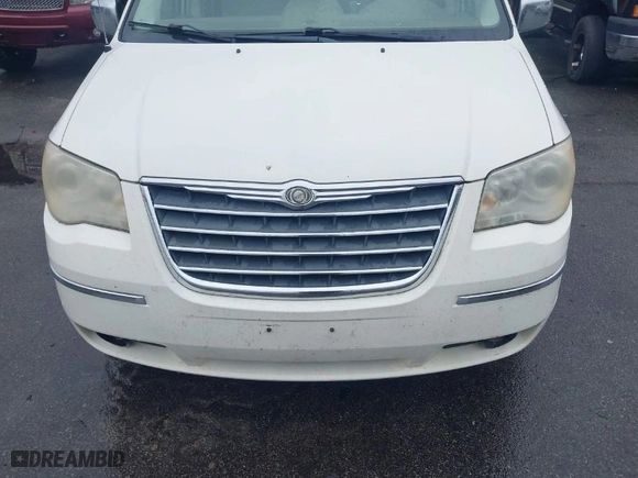 2010 Chrysler Town & Country Limited with VIN 2A4RR6DX1AR141930, listed as a IAAI auction lot 41557272 with NaN miles. Bid and sale history available at carsss.com. Image 6.