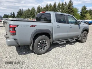2023 Nissan Frontier SV with VIN 1N6ED1EKXPN610735, listed as a Copart auction lot 56197375 with 55,005 mi miles and Salvage title. Bid and sale history available at DreamBid. Image 3.