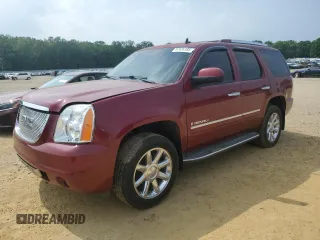 2009 GMC Yukon Denali z VIN 1GKFK03249R210700, wystawiony jako Copart lot #57426195 z przebiegiem 216 561 mil mil oraz Tytuł czysty. Historia ofert i sprzedaży dostępna na DreamBid. Obrazek 1.