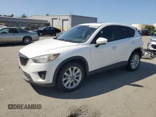 2014 Mazda CX-5 Grand Touring with VIN JM3KE4DY2E0360208, listed as a Copart auction lot 52037885 with 118,306 mi miles and Salvage Title. Bid and sale history available at carsss.com. Image 1.