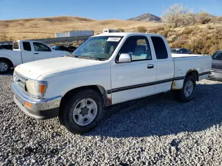 1995 Toyota T100 SR5 with VIN JT4VD12F1S0004904, listed as a Copart auction lot 75796804 with 182,011 mi miles and Salvage Title. Bid and sale history available at DreamBid. Image 1.
