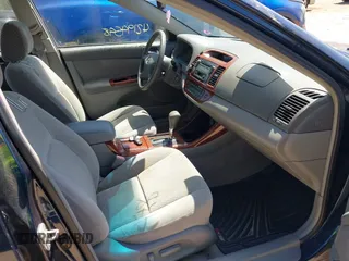 2003 Toyota Camry LE with VIN 4T1BE32K13U204938, listed as a IAAI auction lot 42194548 with 263,710 mi miles and . Bid and sale history available at DreamBid. Image 5.
