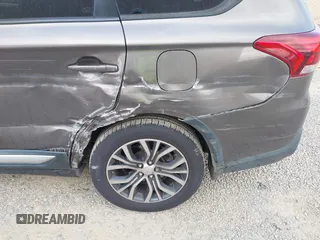2016 Mitsubishi Outlander SE with VIN JA4AD3A38GZ048297, listed as a IAAI auction lot 42634676 with 223,715 mi miles and . Bid and sale history available at DreamBid. Image 12.