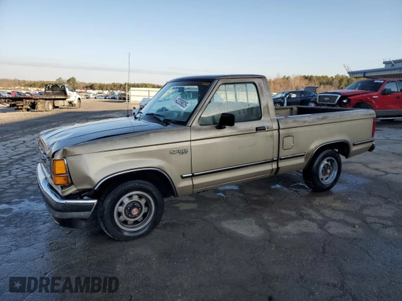 1989 Ford Ranger XL with VIN 1FTCR10AXKUC35082, listed as a Copart auction lot 42209825 with 754,095 mi miles and Salvage title. Bid and sale history available at DreamBid. Image 1.