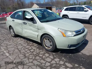 2011 Ford Focus SE with VIN 1FAHP3FN5BW182268, listed as a IAAI auction lot 42059027 with 119,368 mi miles. Bid and sale history available at carsss.com. Image 1.