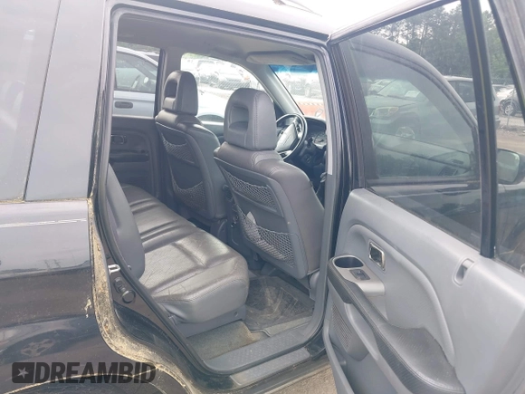2004 Honda Pilot EX with VIN 5FNYF18574B008241, listed as a IAAI auction lot 42248581 with 267,334 mi miles and . Bid and sale history available at DreamBid. Image 8.