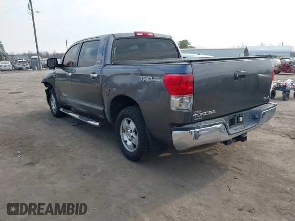2013 Toyota Tundra Limited z VIN 5TFHY5F19DX301615, wystawiony jako IAAI lot #41837145 z przebiegiem 136 398 mil mil oraz . Historia ofert i sprzedaży dostępna na DreamBid. Obrazek 3.